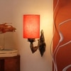Devansh Metal Electric Wall Light in Antique Gold Colour with Orange Shade Count of 1 Light