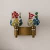 Devansh Metal Electric Wall Light in Gold Colour with Pink Shade Count of 1 Light