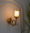 Nena Single Light Wall Fitting In Brass Finish Metal With Amber Glass