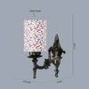Devansh Metal Electric Wall Light in Antique Gold Colour with Multi Shade Count of 1 Light