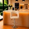 Doe Buck Adjustable Upholstered Bar Stool in Beige Colour with Chrome Base