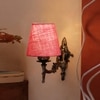 Devansh Metal Electric Wall Light in Antique Gold Colour with Pink Shade Count of 1 Light