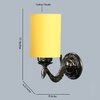 Devansh Metal Electric Wall Light in Antique Gold Colour with Yellow Shade Count of 1 Light
