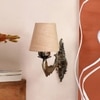 Devansh Metal Electric Wall Light in Antique Gold Colour with Beige Shade Count of 1 Light
