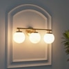 Hollis 3 Light Bathroom Wall Light with Opal Glass In Brass Finish