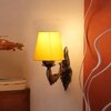 Devansh Metal Electric Wall Light in Antique Gold Colour with Yellow Shade Count of 1 Light