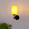 Devansh Metal Electric Wall Light in Black Colour with Yellow Shade Count of 1 Light