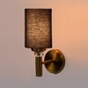 Devansh Metal Electric Wall Light in Gold Colour with Black Shade Count of 1 Light