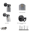Bravo Single Light Wall Fitting In Black Finish Metal With Smoke Glass