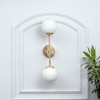 Balts Twin Wall Light In Brass Finish With Opal Glass Globe Shades