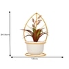 Red And Green Artificial Plant With White And Gold Ceramic Pot