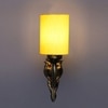 Devansh Metal Electric Wall Light in Antique Gold Colour with Yellow Shade Count of 1 Light