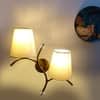 Devansh Metal Electric Wall Light in Gold Colour with off-white Shade Count of 2 Lights