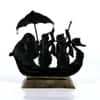 Desert Art Metal Handpainted Dancing Couple Boat Showpiece in Golden Finish
