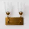 Devansh Metal Electric Wall Light in Antique Gold Colour with Beige Shade Count of 1 Light