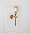Abbie Single Light Wall Fitting In Antique Brass Finish Metal With Amber Glass