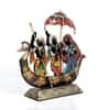 Desert Art Metal Handpainted Dancing Couple Boat Showpiece in Golden Finish