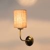 Devansh Metal Electric Wall Light in Gold Colour with Beige Shade Count of 1 Light