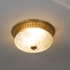 Telmor 11 Inch 2-Light Flush Mount Ceiling Light In Antique Brass Finish With Clear Star Diamond Cut Glass