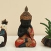 Justen Polyresin  Figurine in Red Colour
