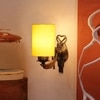 Devansh Metal Electric Wall Light in Antique Gold Colour with Yellow Shade Count of 1 Light
