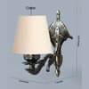 Devansh Metal Electric Wall Light in Antique Gold Colour with off-white Shade Count of 1 Light