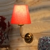 Devansh Metal Electric Wall Light in Gold Colour with Orange Shade Count of 1 Light