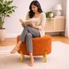 Doe Buck Premium Boucle Round Ottoman in Matte Orange Colour with Polished Gold Legs