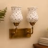 Devansh Metal Electric Wall Light in Antique Gold Colour with Red Shade Count of 1 Light