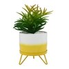 Attractive Faux Plant With Dual Shade Ceramic Pot On A Yellow Stand