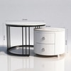 The Top Notch Round Nesting Table With Two Drawers