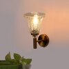 Devansh Metal Electric Wall Light in Gold Colour with Transparent Shade Count of 1 Light