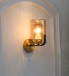 Isabella Single Light Wall Fitting In Black And  Brass  Finish Metal With Amber Glass