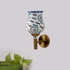 Devansh Metal Electric Wall Light in Gold Colour with Multi Shade Count of 1 Light