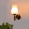 Devansh Metal Electric Wall Light in Gold Colour with White Shade Count of 1 Light