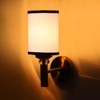 Devansh Metal Electric Wall Light in Gold Colour with Multi Shade Count of 1 Light