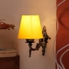 Devansh Metal Electric Wall Light in Antique Gold Colour with Yellow Shade Count of 1 Light