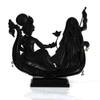 Desert Art Metal Handpainted Couple Boat Showpiece in Multicolour