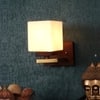 Eliante Key Wood And Iron Wall Light With Glass In Gold And Brown Colour