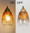 Kichler Single Light Wall Fitting In Brass And Wood Finish Metal With Amber Glass