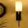 Devansh Metal Electric Wall Light in Black Colour with Off-white Shade Count of 1 Light