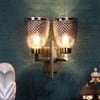 Eliante Tau Iron Wall Light With Glass In Antique Gold Colour