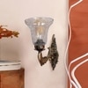 Devansh Metal Electric Wall Light in Antique gold Colour with Transparent Shade Count of 1 Light