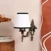Devansh Metal Electric Wall Light in Antique Gold Colour with White & Black Shade Count of 1 Light