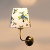 Devansh Metal Electric Wall Light in Gold Colour with Multi Shade Count of 1 Light