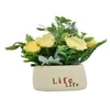 Yellow Artificial Flowers With A Modern Planter