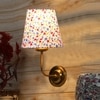 Devansh Metal Electric Wall Light in Gold Colour with Multi Shade Count of 1 Light