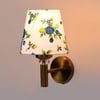 Devansh Metal Electric Wall Light in Gold Colour with Multi Shade Count of 1 Light