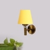 Devansh Metal Electric Wall Light in Gold Colour with Yellow Shade Count of 1 Light