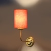 Devansh Metal Electric Wall Light in Gold Colour with Orange Shade Count of 1 Light